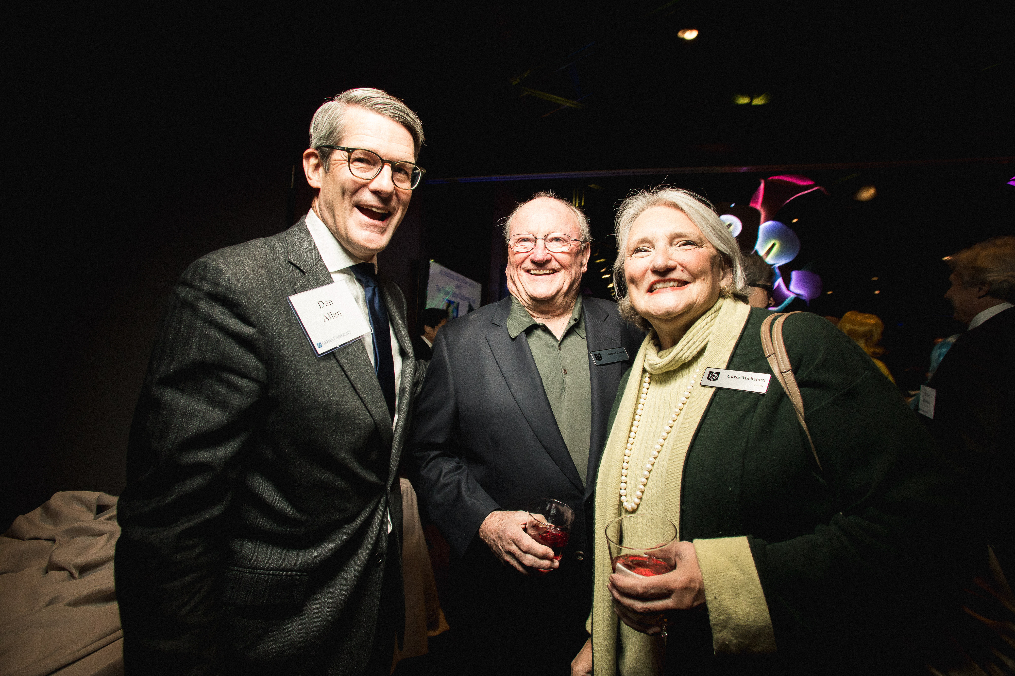 Dan Allen, VP for Advancement with DePaul University Trustee Carla Michelotti and husband Robert Colvin.